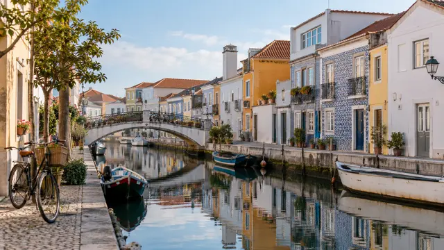 Aveiro-inspired residential canal with small colourful tiled houses.