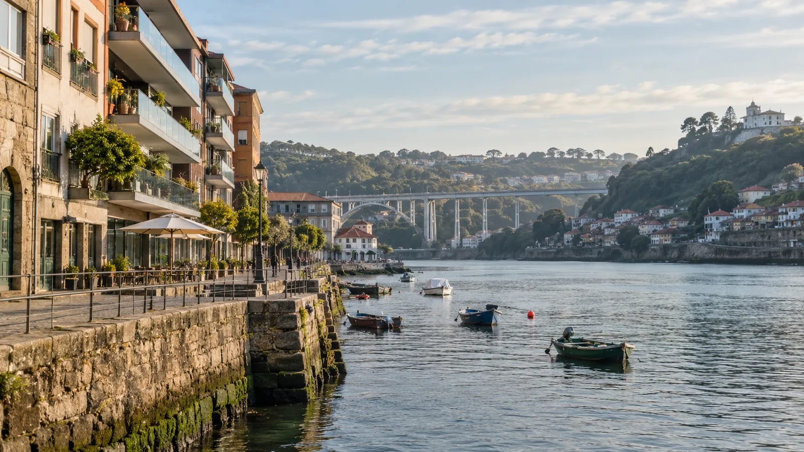 Greater Porto-inspired riverbank suburb with modern apartment balconies.