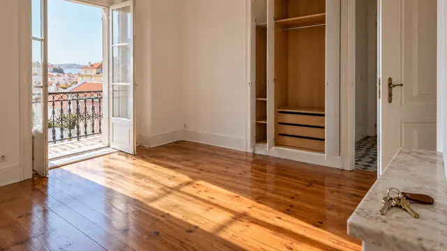 A clean empty rented bedroom after move-out with freshly swept floors.