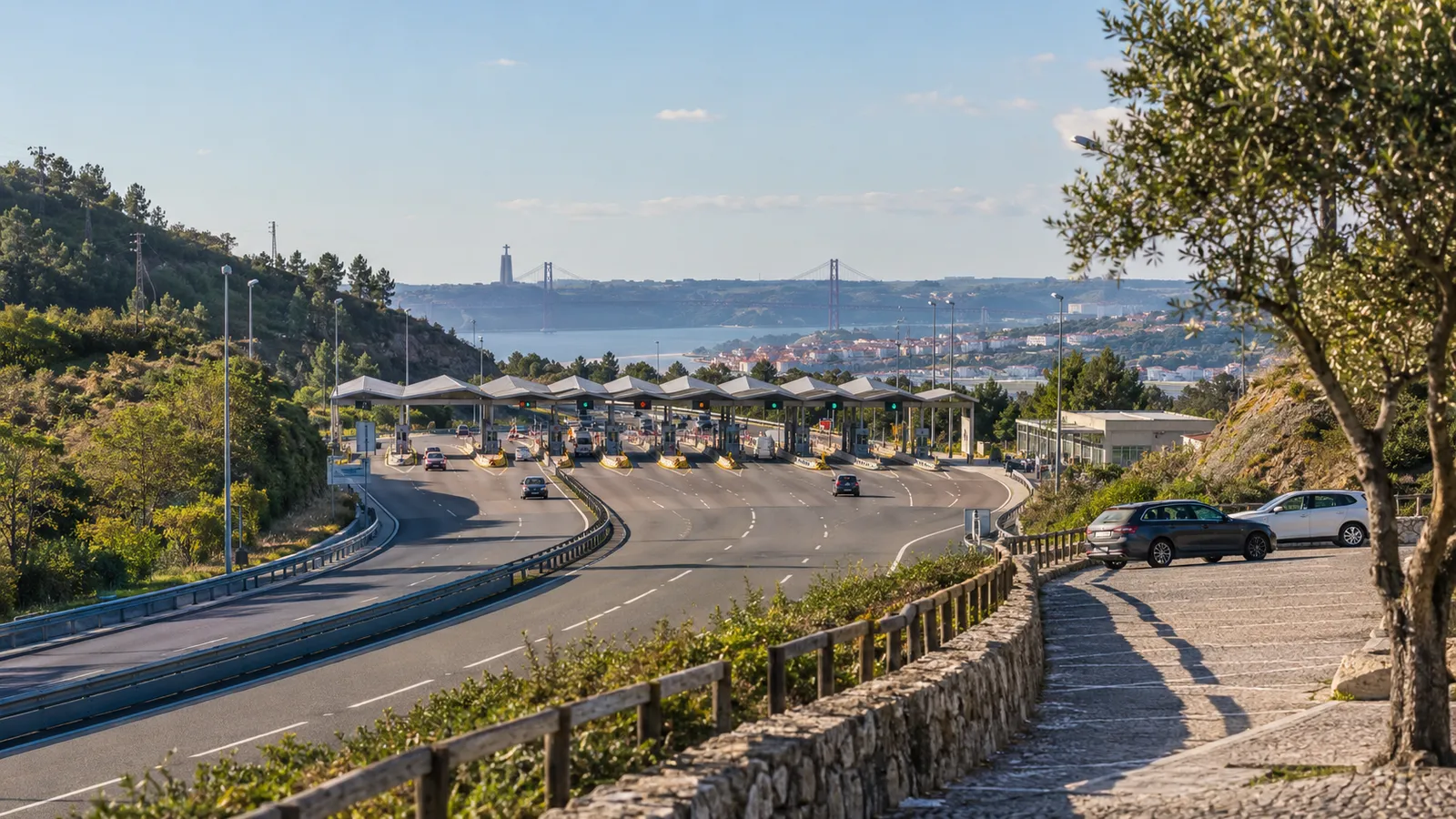 A Portuguese motorway toll approach seen from a safe distant roadside perspective.